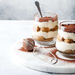 Traditional Italian dessert tiramisu in a glass. Traditional Italian dessert tiramisu in a glass.