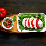 caprese salad with buffalo mozzarella, tomato and basil with ol Italian salad antipasto called caprese with buffalo mozzarella, tomato and basil with olive oil